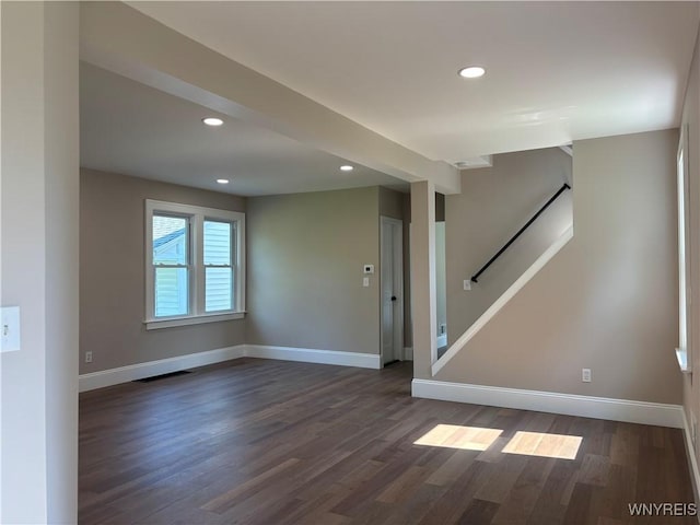 575 Willow Ave, North Tonawanda, NY 14120 - spare room featuring stairway, dark wood-style floors, and recessed lighting