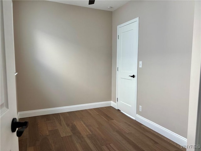 575 Willow Ave, North Tonawanda, NY 14120 - empty room with dark wood-style floors and baseboards