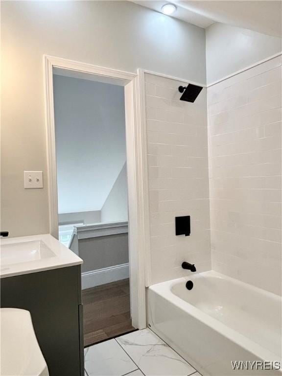 575 Willow Ave, North Tonawanda, NY 14120 - full bath featuring bathing tub / shower combination, vanity, and marble finish floors