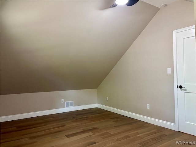 575 Willow Ave, North Tonawanda, NY 14120 - additional living space with lofted ceiling, dark wood-style floors, and a ceiling fan