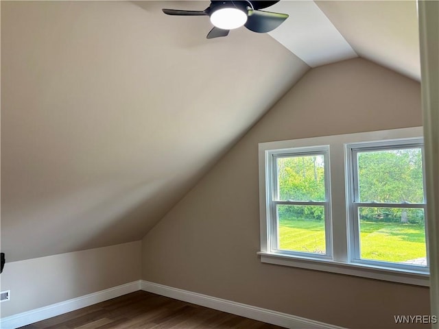 575 Willow Ave, North Tonawanda, NY 14120 - additional living space with dark wood-type flooring, lofted ceiling, and a ceiling fan