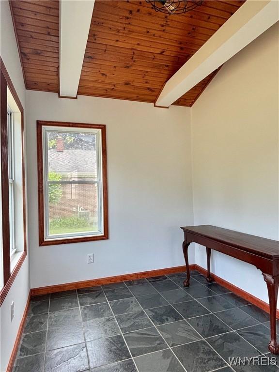575 Willow Ave, North Tonawanda, NY 14120 - spare room featuring wooden ceiling and baseboards