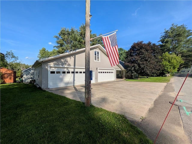 15 Clark Dr, Otto Twp, PA 16745 - view of property exterior with a lawn and driveway