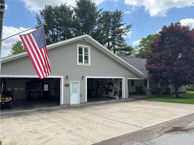 15 Clark Dr, Otto Twp, PA 16745 - view of home's exterior featuring a garage and driveway