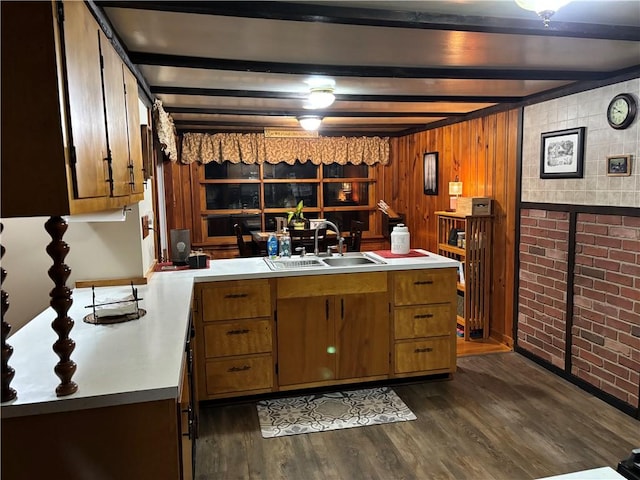 15 Clark Dr, Otto Twp, PA 16745 - kitchen featuring beam ceiling, brown cabinetry, dark wood-style flooring, and light countertops