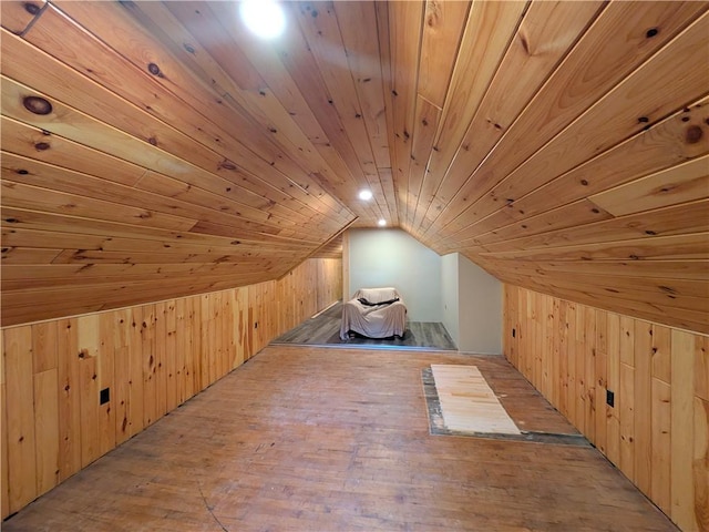 15 Clark Dr, Otto Twp, PA 16745 - additional living space with vaulted ceiling, wooden walls, wood ceiling, and wood-type flooring