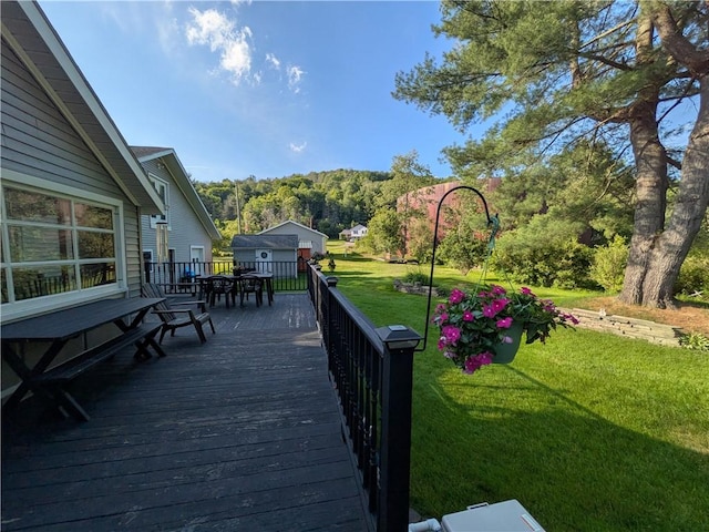 15 Clark Dr, Otto Twp, PA 16745 - deck with outdoor dining area and a yard