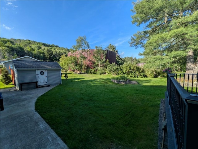 15 Clark Dr, Otto Twp, PA 16745 - view of grassy yard with an outbuilding