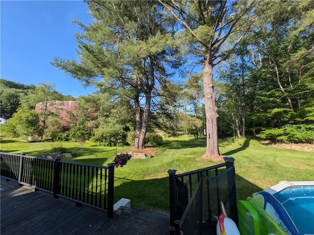 15 Clark Dr, Otto Twp, PA 16745 - wooden terrace with a lawn