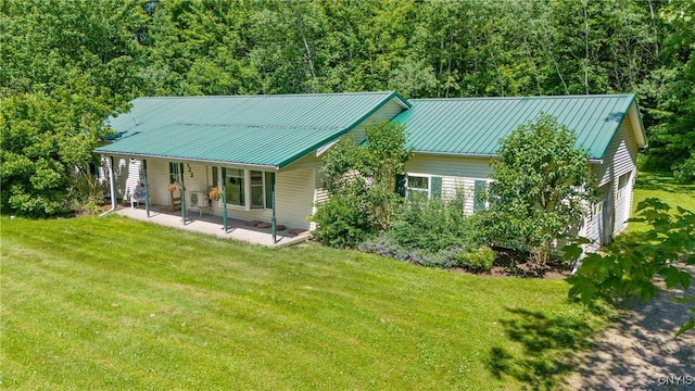 123 Town Line Rd, Volney, NY 13069 - view of front of property with a front yard and a metal roof