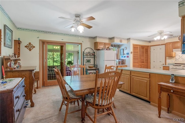 123 Town Line Rd, Volney, NY 13069 - dining space with ceiling fan, light colored carpet, and crown molding