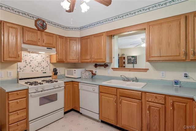 123 Town Line Rd, Volney, NY 13069 - kitchen with white appliances, under cabinet range hood, a ceiling fan, and light countertops