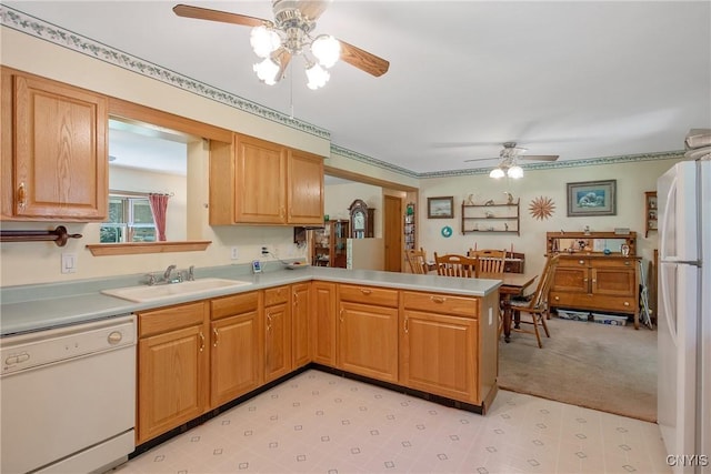 123 Town Line Rd, Volney, NY 13069 - kitchen with white appliances, ceiling fan, light countertops, a peninsula, and light carpet