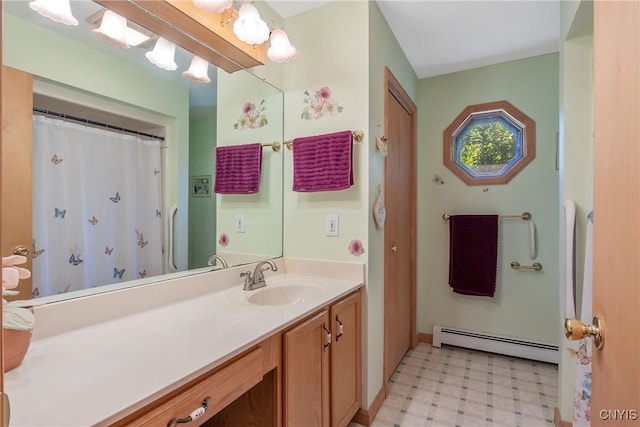 123 Town Line Rd, Volney, NY 13069 - full bathroom with a baseboard heating unit, tile patterned floors, and vanity