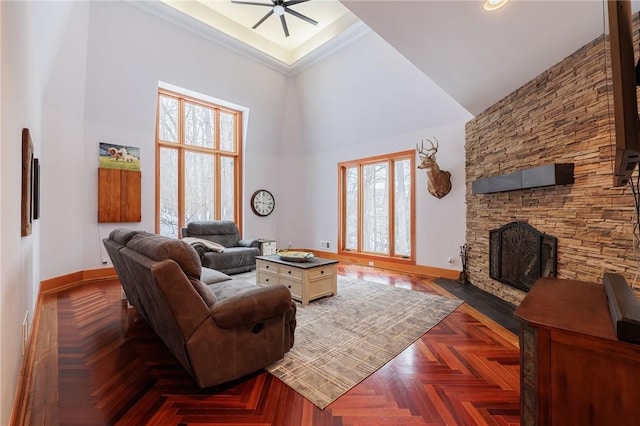 42 Lake Lacoma Dr, Perinton, NY 14534 - living area with a towering ceiling, a stone fireplace, a ceiling fan, and recessed lighting
