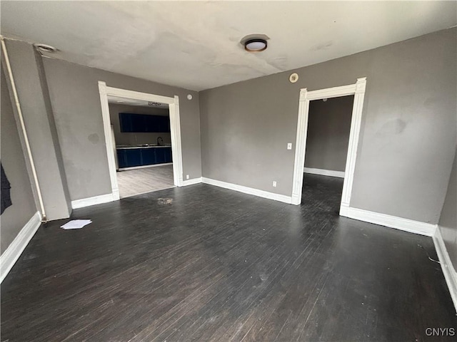 926 Burnet Ave Unit 30, Syracuse, NY 13203 - unfurnished room featuring wood finished floors and baseboards