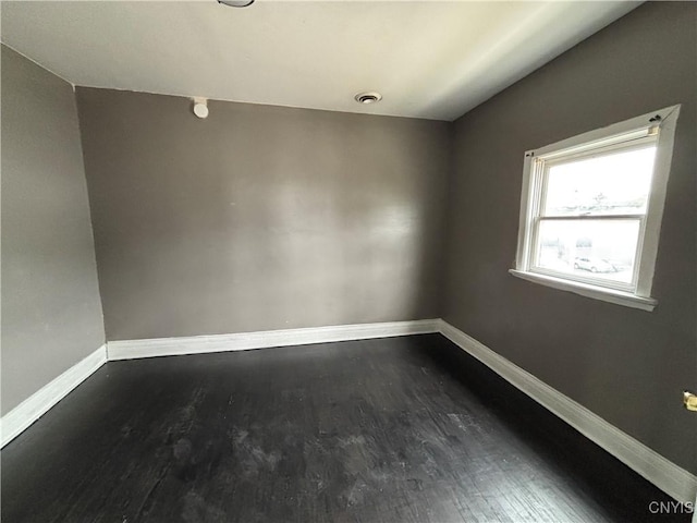 926 Burnet Ave Unit 30, Syracuse, NY 13203 - spare room with dark wood-style floors and baseboards