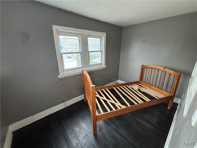 926 Burnet Ave Unit 30, Syracuse, NY 13203 - bedroom featuring dark wood-style floors and baseboards