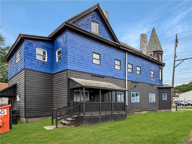 926 Burnet Ave Unit 30, Syracuse, NY 13203 - back of house with a chimney, a yard, and a porch