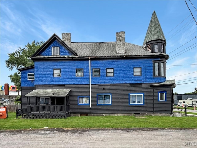 926 Burnet Ave Unit 30, Syracuse, NY 13203 - view of side of property featuring a chimney and a lawn