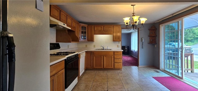 12655 Berwick, Tpke, PA 16925 - kitchen with range with gas stovetop, under cabinet range hood, a chandelier, and light countertops