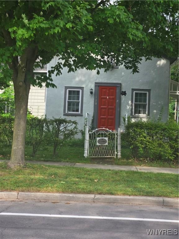 720 Main St, Porter, NY 14174 - view of exterior entry with stucco siding