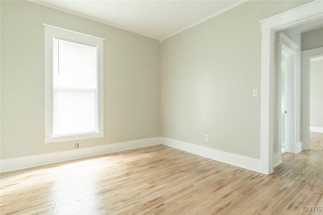 810 Superior St, Watertown City, NY 13601 - empty room featuring light wood-style floors and crown molding