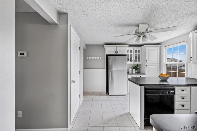 182 Fawn, West Seneca, NY 14224 - kitchen with freestanding refrigerator, dark countertops, a ceiling fan, white cabinets, and black dishwasher