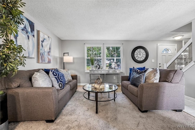 182 Fawn, West Seneca, NY 14224 - carpeted living room with a textured ceiling and stairway