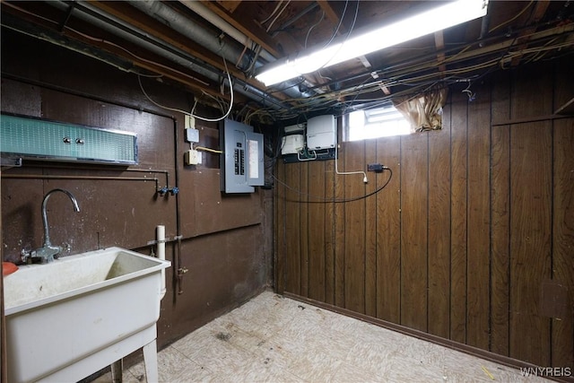 182 Fawn, West Seneca, NY 14224 - basement with electric panel, wood walls, and light floors