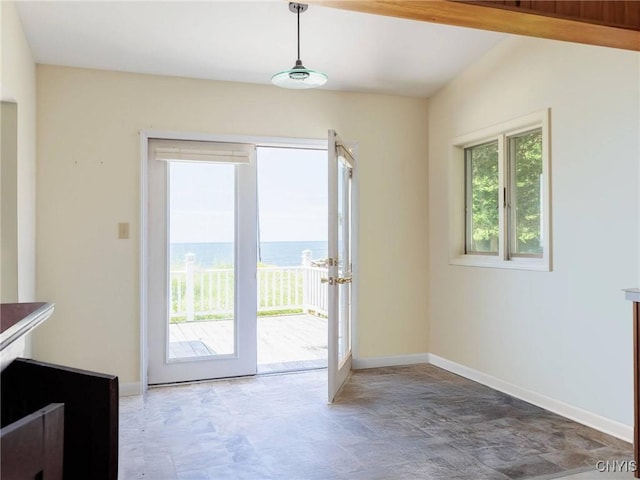 5366 Clark Point Rd, Henderson, NY 13651 - unfurnished dining area featuring a water view, stone finish flooring, and french doors