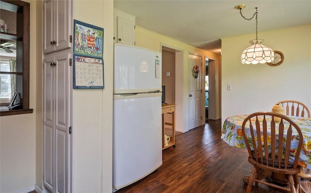 38 Tobin Rd, Henrietta, NY 14467 - kitchen with freestanding refrigerator, dark wood-style flooring, and hanging light fixtures