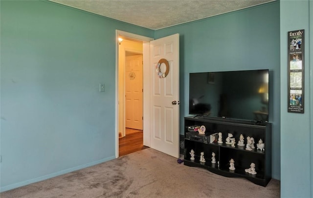 38 Tobin Rd, Henrietta, NY 14467 - carpeted living area with a textured ceiling and baseboards