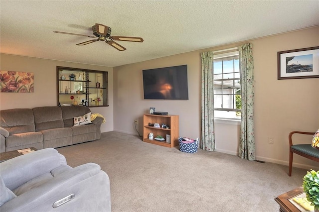 38 Tobin Rd, Henrietta, NY 14467 - carpeted living area featuring a ceiling fan and a textured ceiling