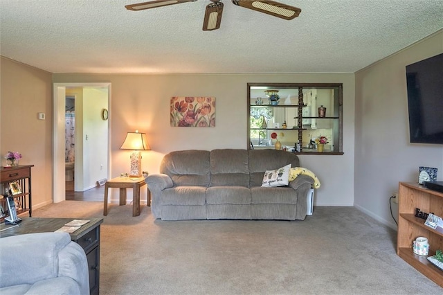 38 Tobin Rd, Henrietta, NY 14467 - carpeted living room featuring a ceiling fan and a textured ceiling