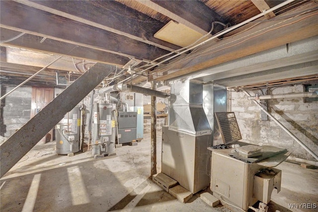 214 Ludington St, Buffalo, NY 14206 - unfinished basement featuring water heater and heating unit