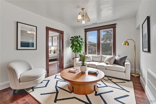 214 Ludington St, Buffalo, NY 14206 - living room with a chandelier and wood finished floors