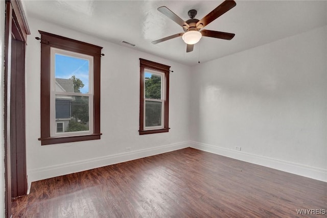 214 Ludington St, Buffalo, NY 14206 - spare room featuring dark wood-style flooring and ceiling fan
