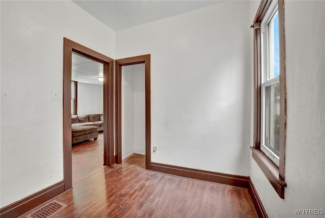 214 Ludington St, Buffalo, NY 14206 - spare room with wood finished floors and baseboards