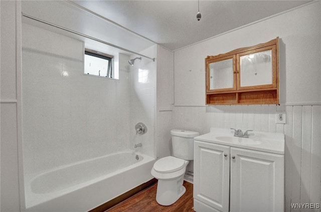 214 Ludington St, Buffalo, NY 14206 - bathroom featuring washtub / shower combination, vanity, wood finished floors, and wainscoting