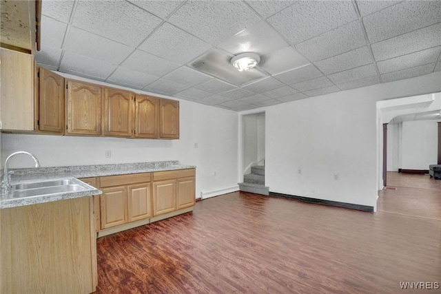 214 Ludington St, Buffalo, NY 14206 - kitchen with dark wood-style flooring, light countertops, a paneled ceiling, and open floor plan