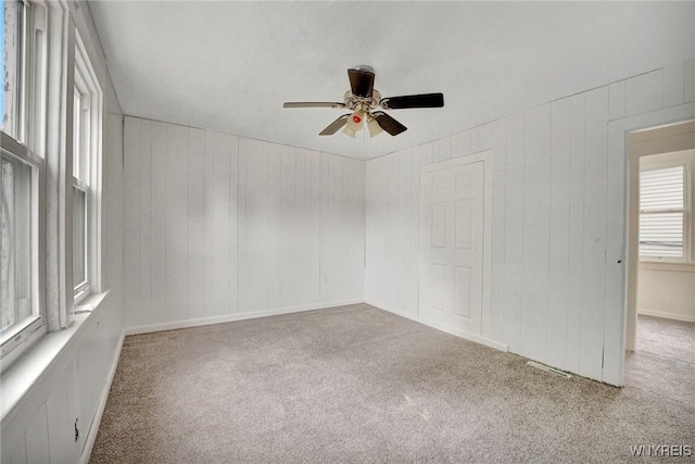 214 Ludington St, Buffalo, NY 14206 - spare room featuring carpet and a ceiling fan