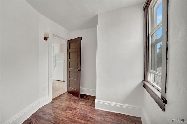 214 Ludington St, Buffalo, NY 14206 - empty room featuring plenty of natural light and wood finished floors