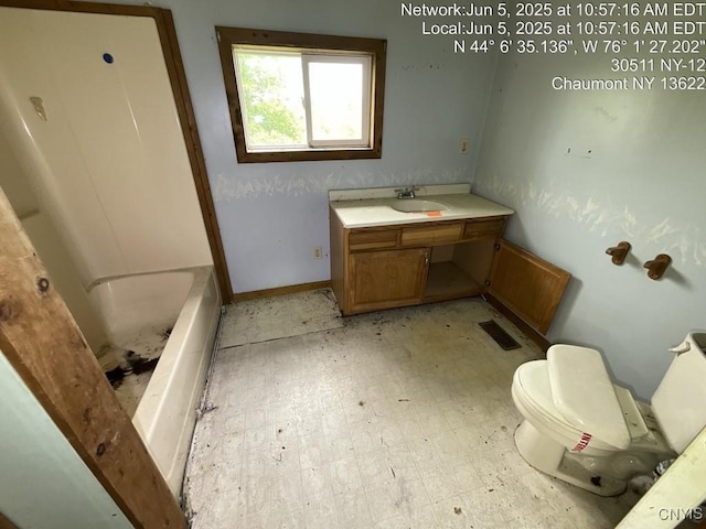 30511 State Route 12, Clayton, NY 13622 - bathroom with a bath, vanity, and tile patterned floors