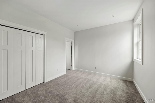 3745 Fisher Rd, Skaneateles, NY 13152 - unfurnished bedroom featuring carpet and a closet