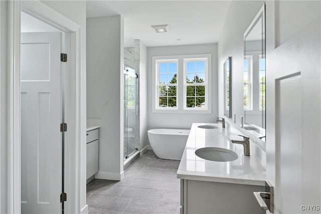 3745 Fisher Rd, Skaneateles, NY 13152 - bathroom with double vanity, a shower stall, and a soaking tub
