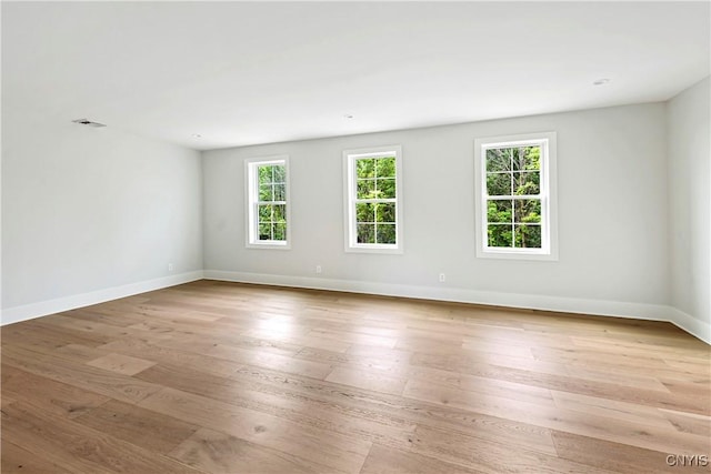 3745 Fisher Rd, Skaneateles, NY 13152 - spare room with wood-type flooring and baseboards