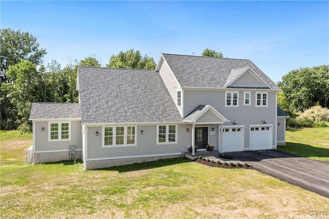 3745 Fisher Rd, Skaneateles, NY 13152 - view of front of property featuring driveway, an attached garage, a front lawn, and a shingled roof