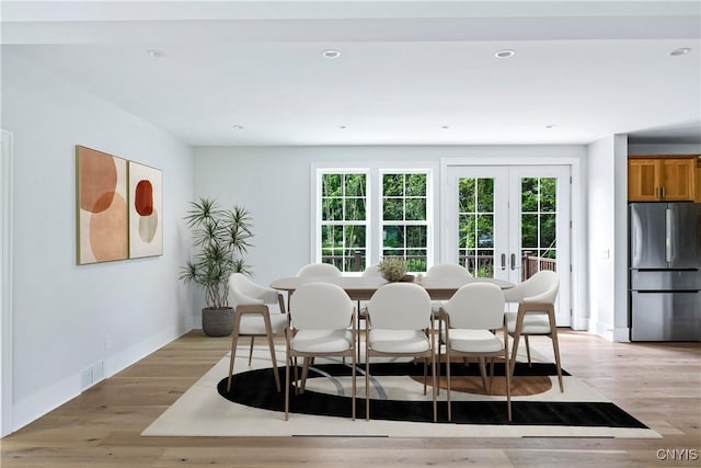 3745 Fisher Rd, Skaneateles, NY 13152 - dining space with light wood finished floors and recessed lighting