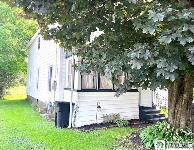 1504 River St, Olean, NY 14760 - view of home's exterior with a lawn and crawl space